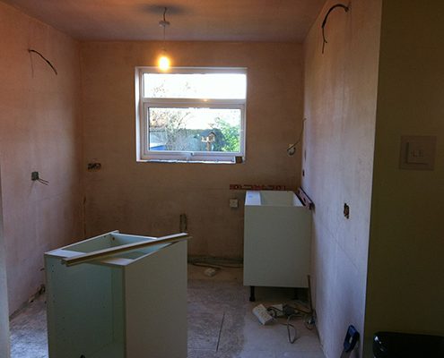 white kitchen with range cooker