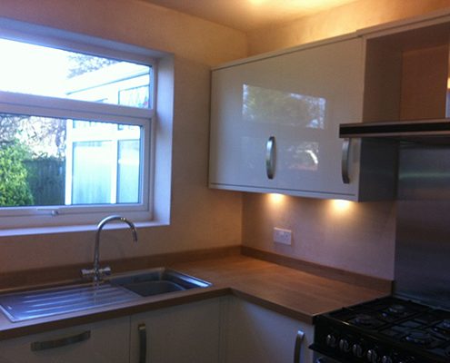 white kitchen with range cooker