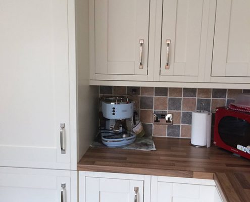 White kitchen with lowered ceiling