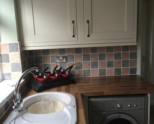 White kitchen with lowered ceiling