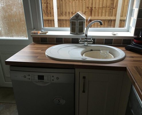 White kitchen with lowered ceiling