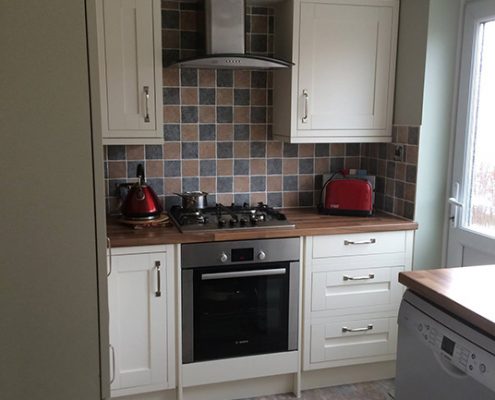 White kitchen with lowered ceiling