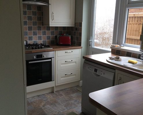 White kitchen with lowered ceiling