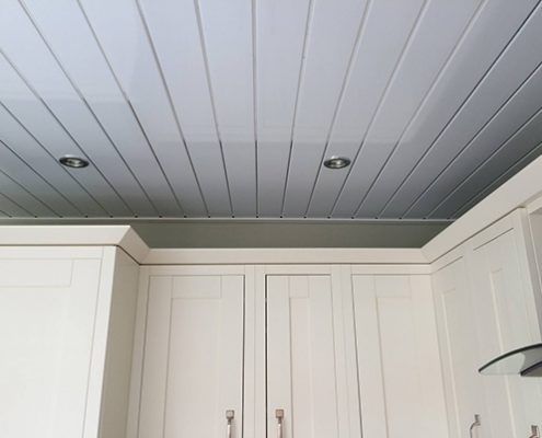 White kitchen with lowered ceiling