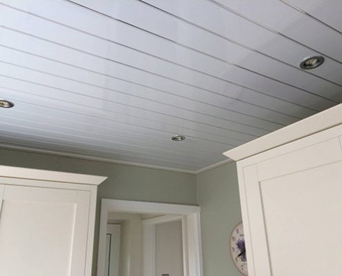 White kitchen with lowered ceiling