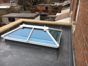 extension with parapet wall and sky lantern