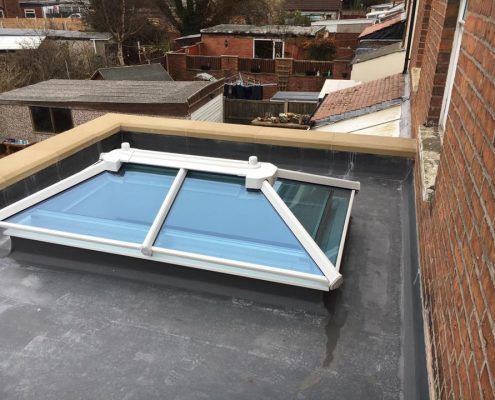 extension with parapet wall and sky lantern