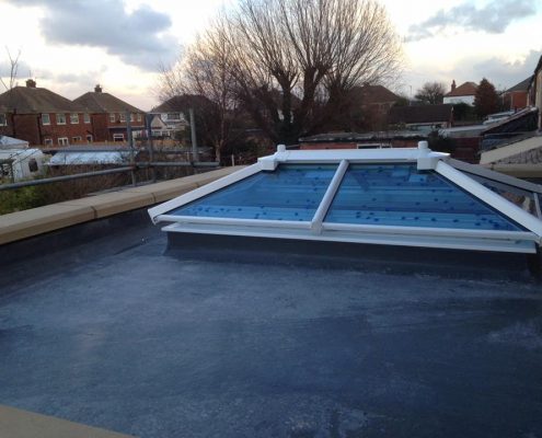 extension with parapet wall and sky lantern