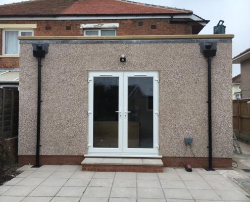 extension with parapet wall and sky lantern