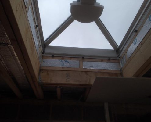 extension with parapet wall and sky lantern