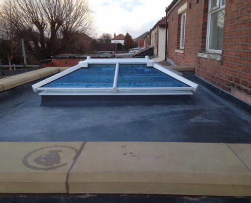 extension with parapet wall and sky lantern
